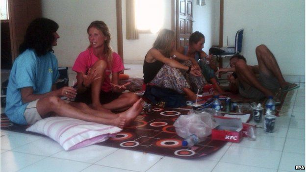 A picture made available on 18 August 2014 shows foreign survivors taking a rest after being rescued from a sinking tourist boat at a house in the outskirts of Bima, West Nusa Tenggara province, Indonesia, 17 August 2014