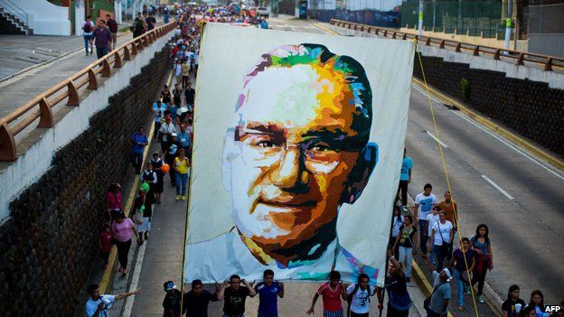Catholics march in San Salvador on 22 March 2014 during the commemoration of the 33th anniversary of the murder of Oscar Romero