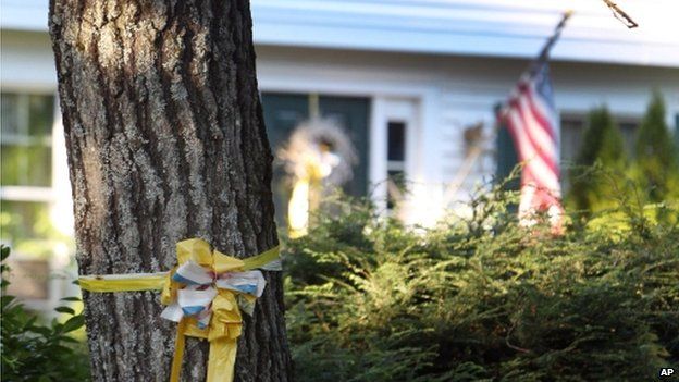A ribbon is tied to a tree outside the home of James Foley in Rochester, New Hampshire. Photo: 19 August 2014