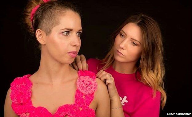 Model Kayleigh Rose (left) is fitted by Kelly Bull into the loom band top
