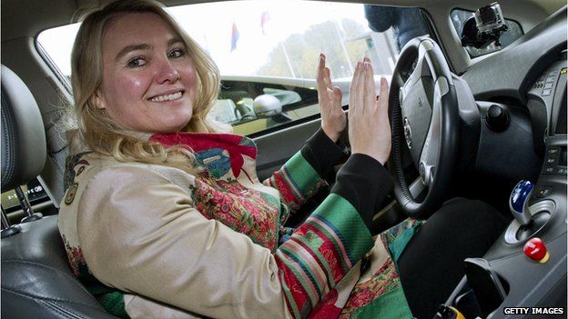 Dutch Minister of Infrastructure and Environment Melanie Schultz van Haegen in a self-driving car on November 12, 2013