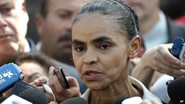 Brazilian Socialist Party (PSB) presidential candidate Marina Silva speaks to the press after attending a Mass in honour of late presidential candidate Eduardo Campos in Brasilia, Tuesday, Aug. 19, 2014.