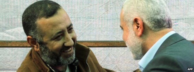 Mohammed Abu Shamala (L) with Hamas official Ismail Haniya in an image from 26 February