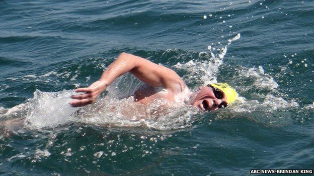Cyril Baldock swimming in the sea