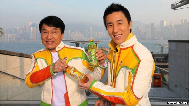 Jackie Chan and his son Jaycee attend a commercial advertisement taping on 21 January, 2009 in Shanghai, China