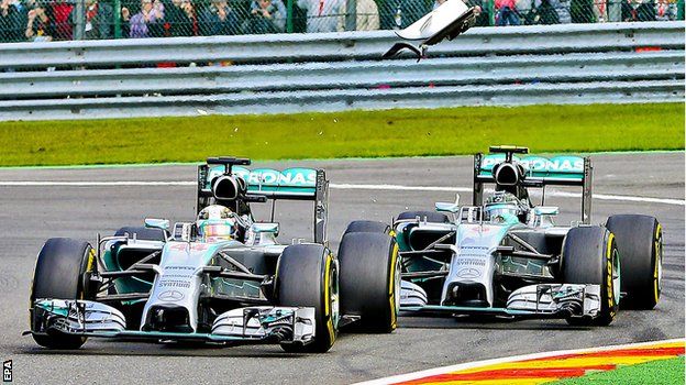 Rosberg touches the back of Hamilton's Mercedes