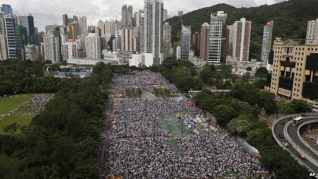 Tens of thousands of residents joined the annual pro-democracy protest in Hong Kong Tuesday, July 1, 2014.