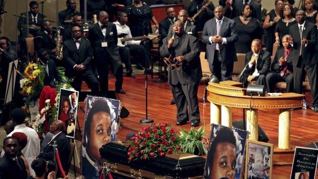 Musicians perform during funeral service for Michael Brown at Friendly Temple Missionary Baptist Church in St. Louis, Missouri