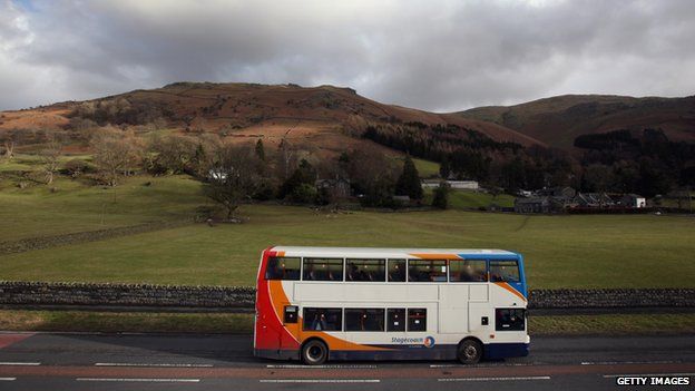 Bus drives through Lake District