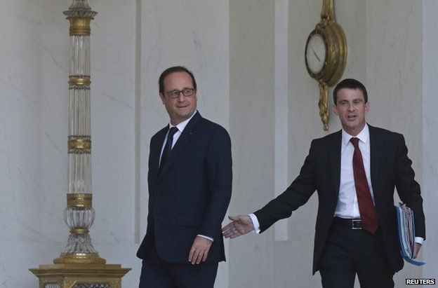 Manuel Valls (R) with Francois Hollande at the Elysee Palace, 30 July
