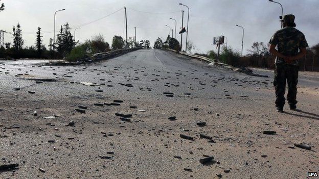 The approach road to Tripoli airport, littered with shells, on 21 August 2014