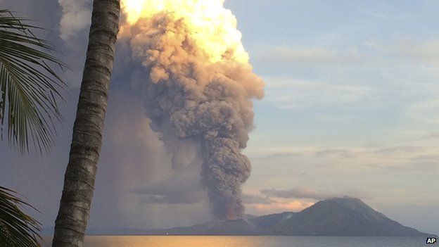 In this photo taken and released by Jason Tassell, a huge smoke billows from Mt. Tavurvu after an eruption in Kokopo, east New Britain, Papua New Guinea, on Friday, 29 August 2014