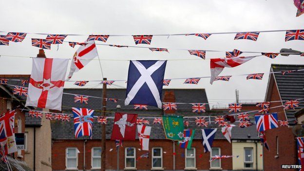 The Scottish saltire flies among other flags in East Belfast