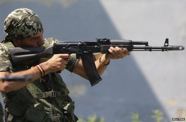 Spanish volunteer Rafa Munoz Perez practising with a rifle in Donetsk, 7 August