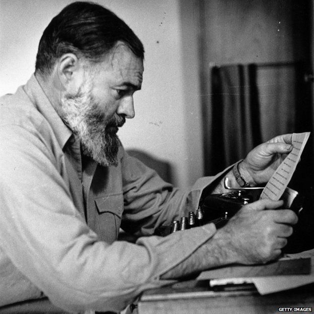 Ernest Hemingway at his typewriter during World War Two