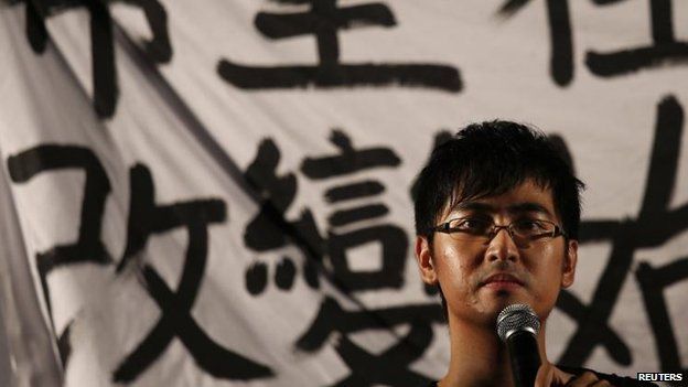 Alex Chow, secretary-general of the Hong Kong Federation of Students, speaks in the Central district, 31 Aug