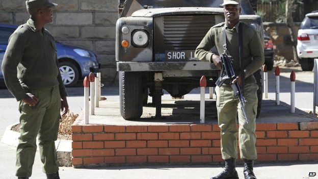 Army personnel man outside the military headquarters in Maseru, Lesotho on 31 August 2014.