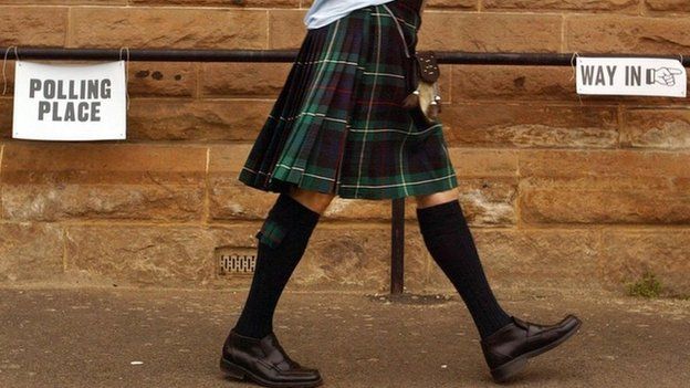man walking to polling place