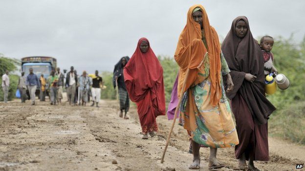 Civilians who had left the town of Bulomarer when it was held by al-Shabab militants, return following the town's capture by African Union (AU) and Somali government soldiers (1 September 2014)