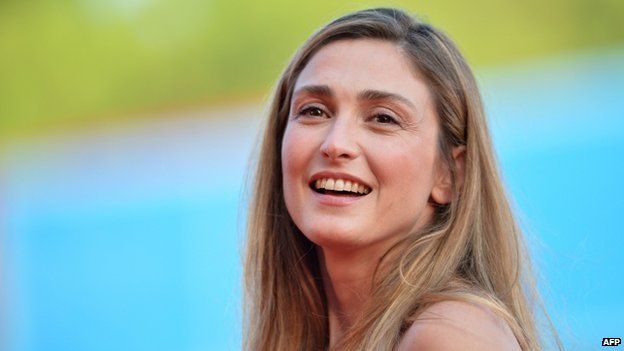 French actress Julie Gayet arrives for the opening ceremony of the 71st Venice Film Festival at Venice Lido on 27 August 2014