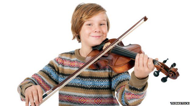 Boy plays violin