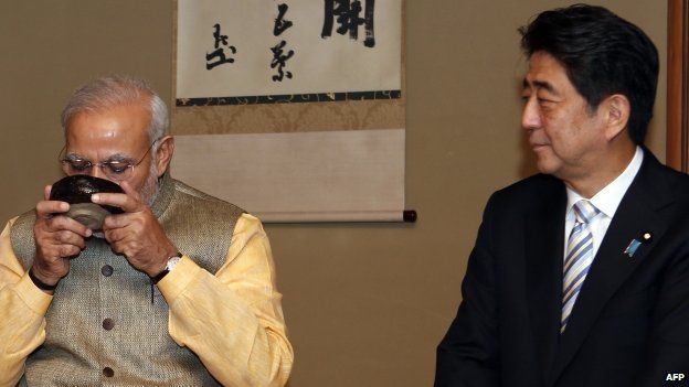 Paper say PM Narendra Modi (left) and his Japan counterpart Shinzo Abe are "good friends"