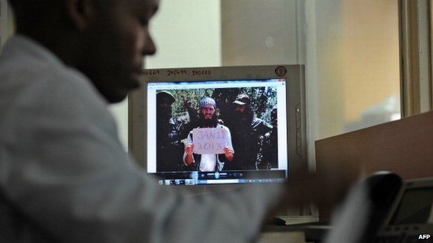 An undated photo of Omar Hammami [C] aka "the American" taken at an undisclosed location is seen on a computer screen in Nairobi, Kenya on 7 February 2013