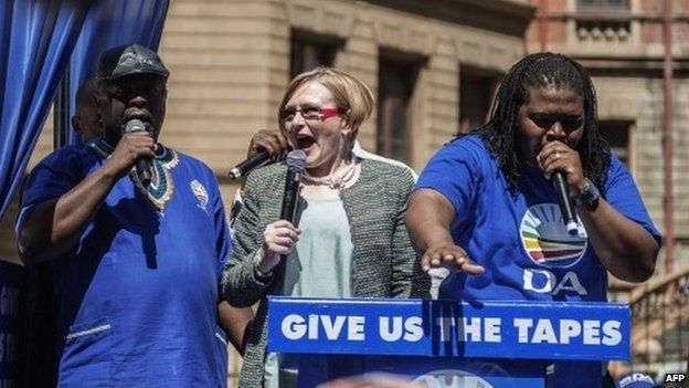 South African opposition leader Hellen Zille addresses a crowd of supporters outside the High Court in Pretoria on 4 September 2014