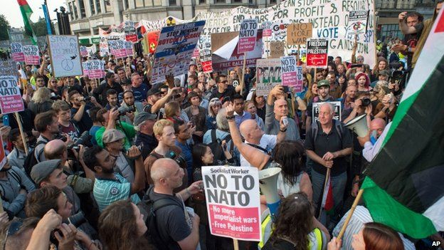 Four arrests at anti-Nato protest in Cardiff - BBC News