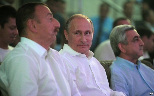 Russian President Vladimir Putin (centre) with Azerbaijani President Ilham Aliyev (left) and Armenian President Serge Sarkisian in Sochi, 9 August