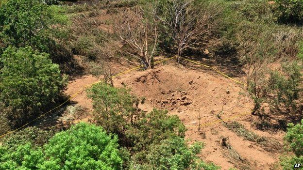 Picture shows an impact crater made by a small meteorite in a wooded area near Managua's international airport.