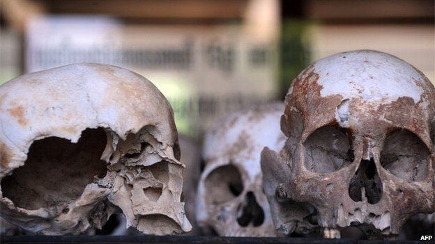 Skulls are displayed at the Choeung Ek killing fields memorial in Phnom Penh on 25 June, 2011