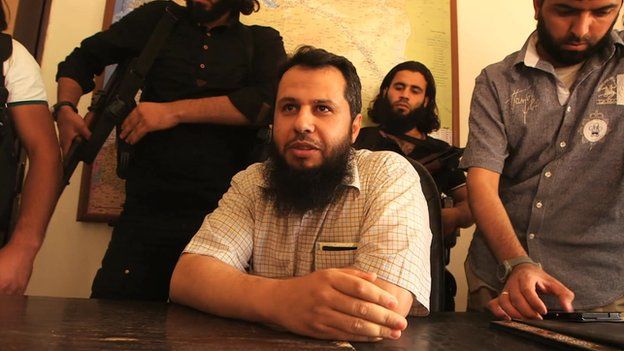 Hassan Abboud (seated) and members of the Islamic Front