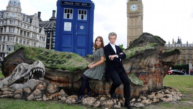 Peter Capaldi and Jenna Coleman attend a photocall ahead of the new BBC series of "Dr Who" in Parliament Square in August 2014