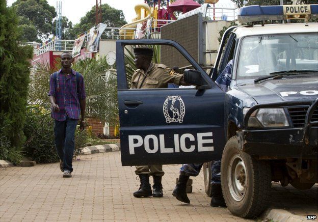 Ugandan police stand guard outside a popular shopping mall in the capital Kampala - 14 September 2014