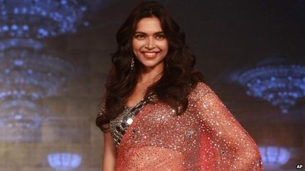 Bollywood actor Deepika Padukone looks on during a press