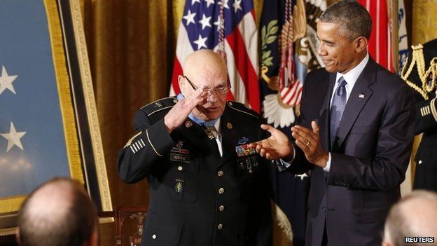 US President Barack Obama awards the Medal of Honor to Army Command Sergeant Major Bennie G. Adkins