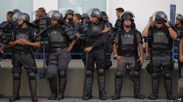 Police near the Maracana stadium on the last day of the World Cup, Sunday 13 July 2014