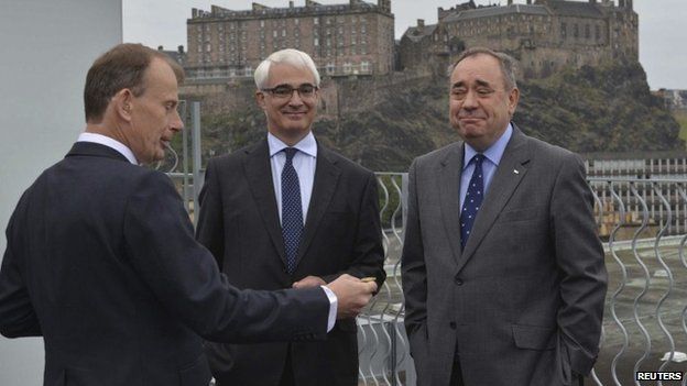 Andrew Marr tosses a coin before Alistair Darling and Alex Salmond appear on his weekly BBC show