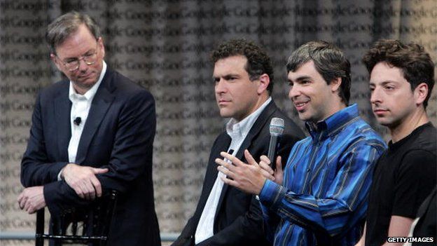 Eric Schmidt, Google CEO, and founders Sergey Brin and Larry Page with a forth member of the Google management