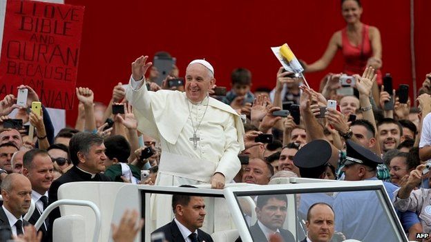 Pope Francis waves to crowds in Tirana, Albania - 21 September 2014