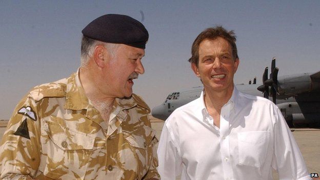 Tony Blair walking alongside Gen Peter Wall as he arrived in Basra in May 2003.