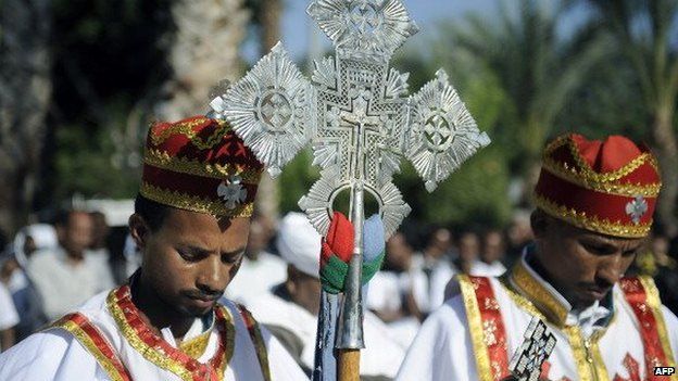 Eritrean Christians lead a memorial service held in Tel Aviv, on 12 October 12, 2013, in honour of victims of the Lampedusa shipwreck , off Italy's southern-most point