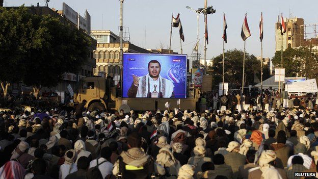 Supporters of Abdul Malik al-Houthi listen to his speech in Sanaa, 23 September 2014