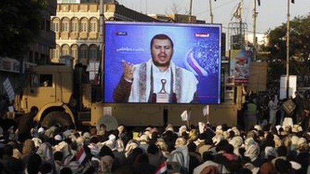Supporters of Abdul Malik al-Houthi listen to his speech in Sanaa, 23 September 2014
