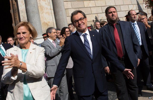 Artur Mas emerges after signing the decree at the Generalitat Palace in Barcelona, 27 September