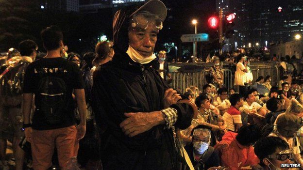 A 82-year-old resident joins thousands take parting in a pro-democracy rally outside the government headquarters in Hong Kong 27 September 2014.