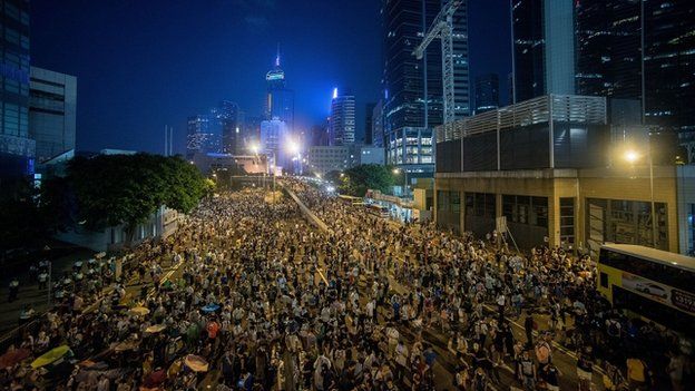 Protesters clash with riot police on 28 September 2014 in Hong Kong.