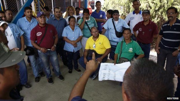Clorox workers attend a gathering at the company headquarters in Valles del Tuy, in Miranda stat, on 26 September, 2014