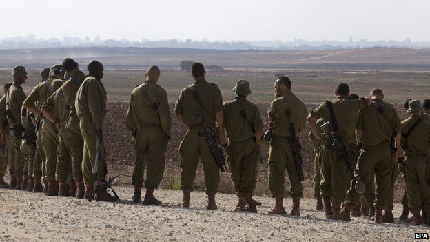 Israeli troops near the border between Israel and the Gaza Strip